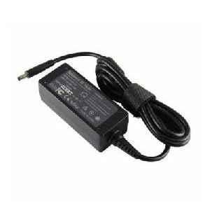 Dell 65wt new black pin adapter com. Laptop Power Adapter